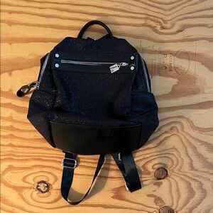 Black Backpack with Silver Accents